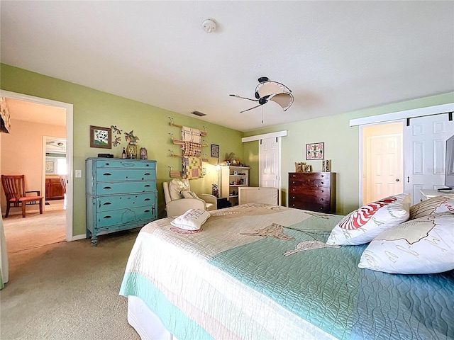 255 Lake Link Rd, Winter Haven, FL 33884 - bedroom with multiple closets, light carpet, and ceiling fan