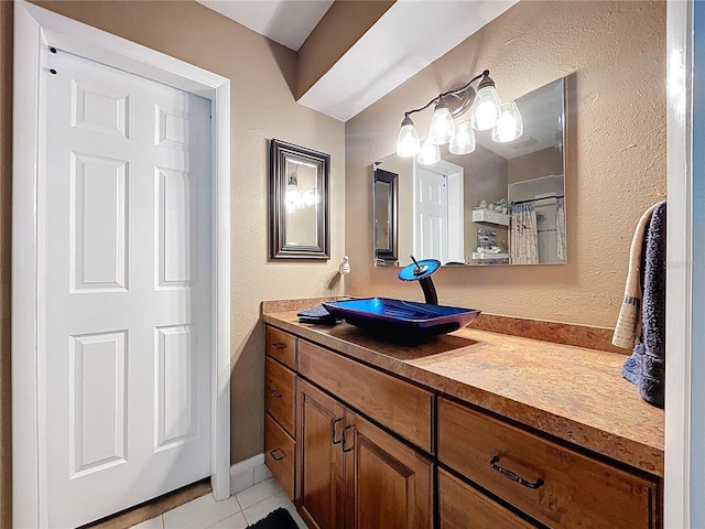 255 Lake Link Rd, Winter Haven, FL 33884 - full bath with vanity, tile patterned floors, and a textured wall