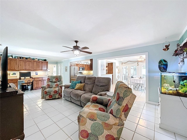 255 Lake Link Rd, Winter Haven, FL 33884 - living area featuring light tile patterned flooring, a ceiling fan, and a desk