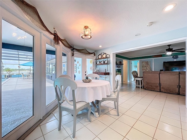 255 Lake Link Rd, Winter Haven, FL 33884 - dining space featuring a ceiling fan, light tile patterned floors, recessed lighting, and a textured ceiling