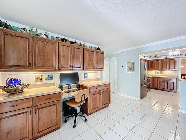 255 Lake Link Rd, Winter Haven, FL 33884 - office space featuring built in study area, light tile patterned floors, baseboards, and a textured ceiling
