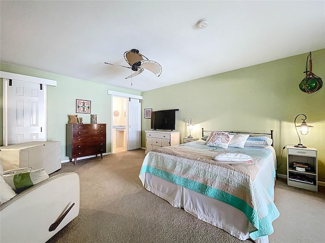 255 Lake Link Rd, Winter Haven, FL 33884 - carpeted bedroom featuring connected bathroom and a ceiling fan