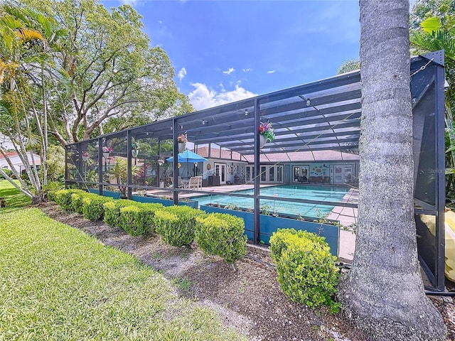 255 Lake Link Rd, Winter Haven, FL 33884 - swimming pool featuring a lawn and shuffleboard