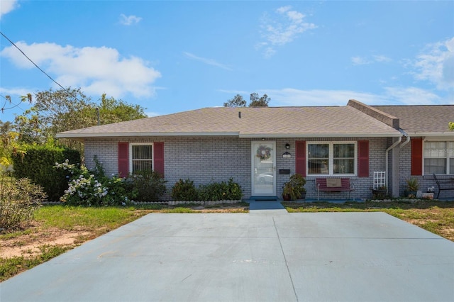 1408 Thousand Roses Dr S, Lake Wales, FL 33853 - single story home with brick siding and roof with shingles