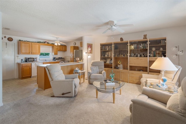 1408 Thousand Roses Dr S, Lake Wales, FL 33853 - living area featuring ceiling fan and a textured ceiling