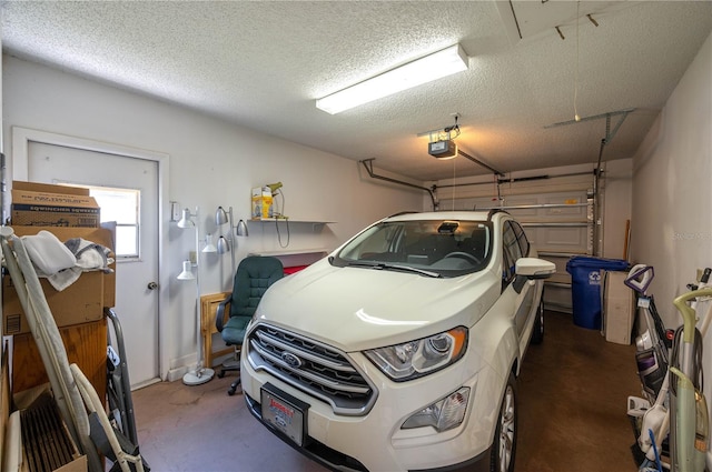 3245 Prairie Dunes Cir E, Lakeland, FL 33810 - garage featuring a garage door opener