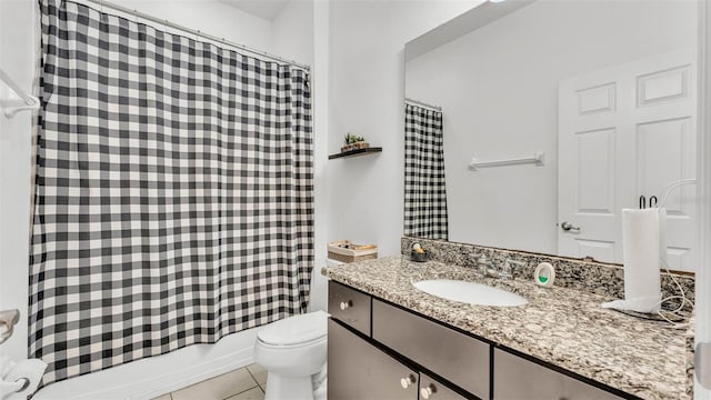 428 Aragosa Dr, Davenport, FL 33837 - full bathroom featuring toilet, tile patterned flooring, vanity, and shower / bath combination with curtain