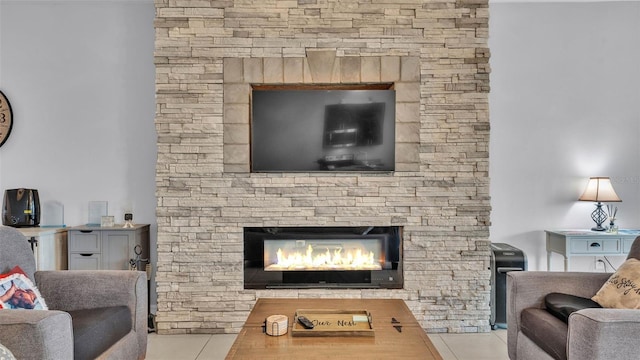 428 Aragosa Dr, Davenport, FL 33837 - living area with tile patterned floors and a stone fireplace