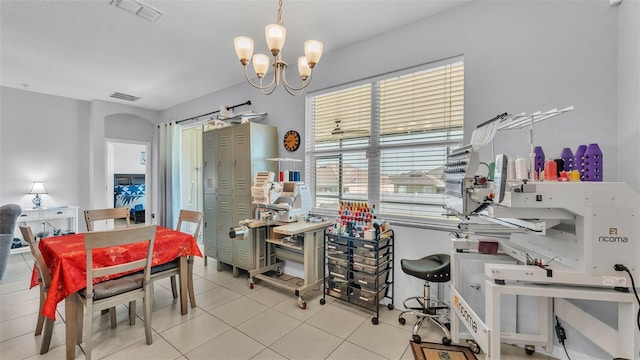 428 Aragosa Dr, Davenport, FL 33837 - dining area featuring a chandelier and tile patterned flooring