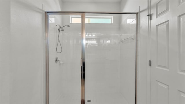 428 Aragosa Dr, Davenport, FL 33837 - bathroom featuring a shower stall