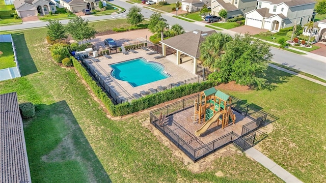 428 Aragosa Dr, Davenport, FL 33837 - aerial perspective of suburban area with a pool