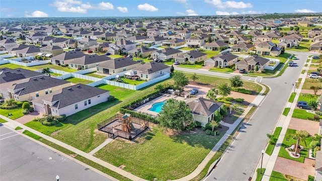 428 Aragosa Dr, Davenport, FL 33837 - aerial perspective of suburban area with a pool area