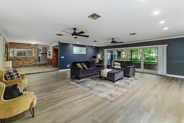 418 N Rd, Lakeland, FL 33809 - living room with light wood-type flooring, baseboards, crown molding, recessed lighting, and a ceiling fan