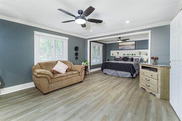 418 N Rd, Lakeland, FL 33809 - bedroom with light wood-style floors, crown molding, baseboards, a ceiling fan, and recessed lighting