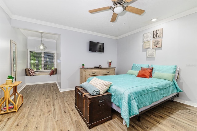 418 N Rd, Lakeland, FL 33809 - bedroom featuring light wood finished floors, baseboards, ornamental molding, and ceiling fan
