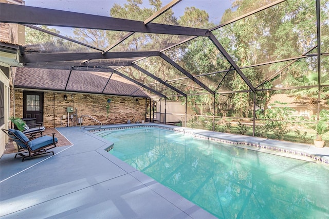 418 N Rd, Lakeland, FL 33809 - outdoor pool with a patio and glass enclosure