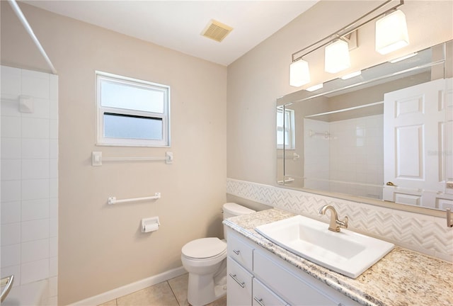 630 Heather Glen Loop, Winter Haven, FL 33884 - full bath featuring healthy amount of natural light, toilet, tile patterned flooring, and vanity