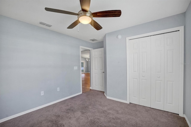 648 Lorient Dr, Eagle Lake, FL 33839 - unfurnished bedroom with carpet floors, a closet, and ceiling fan