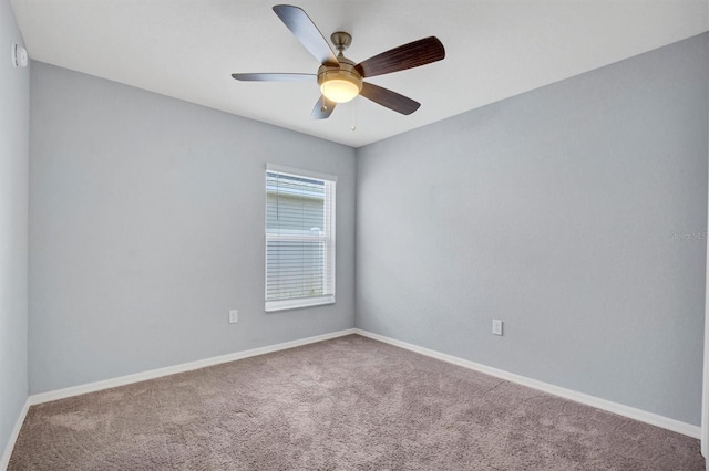 648 Lorient Dr, Eagle Lake, FL 33839 - empty room featuring carpet floors and a ceiling fan