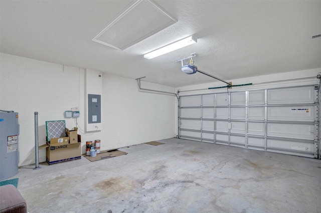 648 Lorient Dr, Eagle Lake, FL 33839 - garage with electric panel, a garage door opener, and water heater