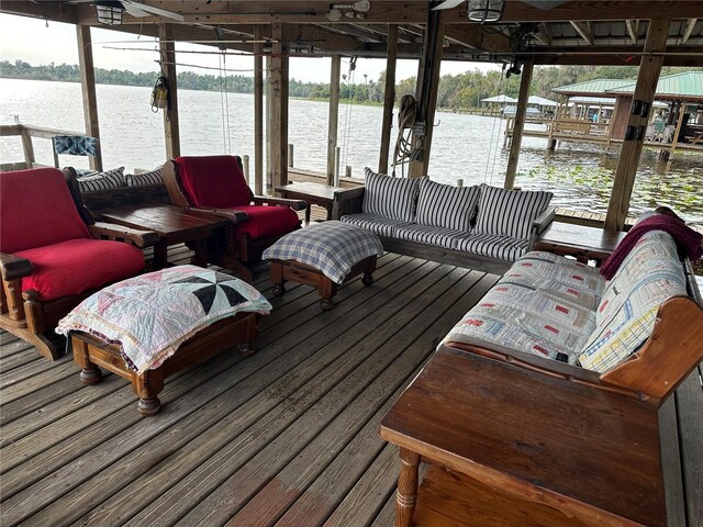 9402 Cat Track Trl, Lake Wales, FL 33898 - dock featuring boat lift and a water view