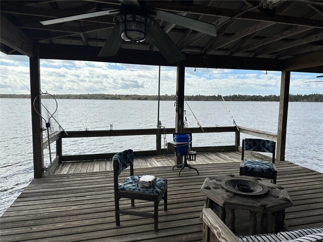 9402 Cat Track Trl, Lake Wales, FL 33898 - dock area featuring boat lift and a water view