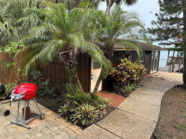 9402 Cat Track Trl, Lake Wales, FL 33898 - view of home's exterior with fence and a gate