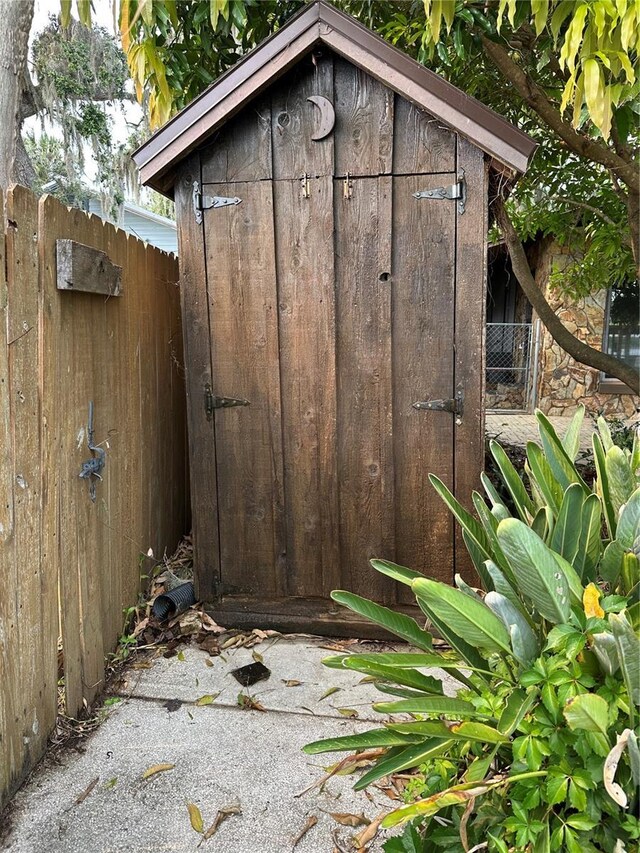 9402 Cat Track Trl, Lake Wales, FL 33898 - view of shed featuring fence