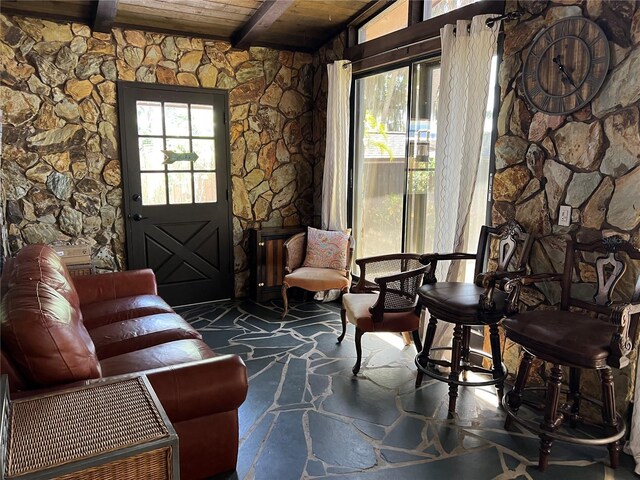 9402 Cat Track Trl, Lake Wales, FL 33898 - sitting room with stone flooring, wood ceiling, and beam ceiling