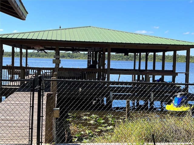 9402 Cat Track Trl, Lake Wales, FL 33898 - dock with a water view and fence