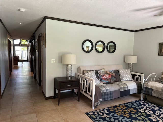 9402 Cat Track Trl, Lake Wales, FL 33898 - bedroom featuring crown molding, a textured ceiling, tile patterned flooring, and baseboards