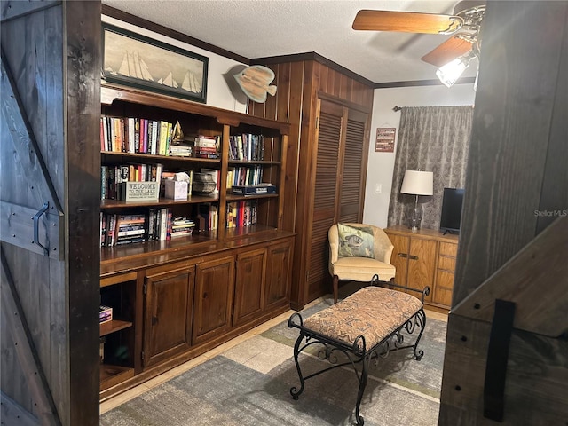 9402 Cat Track Trl, Lake Wales, FL 33898 - living area with crown molding and a ceiling fan