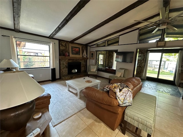 9402 Cat Track Trl, Lake Wales, FL 33898 - tiled living room with a ceiling fan, a stone fireplace, and baseboards