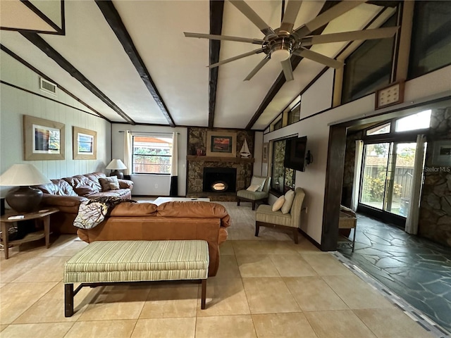 9402 Cat Track Trl, Lake Wales, FL 33898 - living room with baseboards, a fireplace, a ceiling fan, and light tile patterned floors
