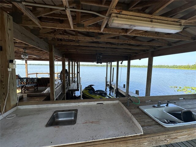 9402 Cat Track Trl, Lake Wales, FL 33898 - dock with a water view and boat lift
