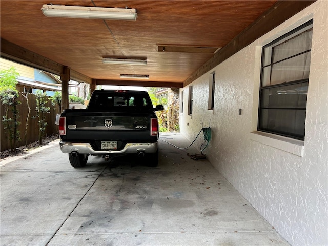 9402 Cat Track Trl, Lake Wales, FL 33898 - view of parking / parking lot featuring fence