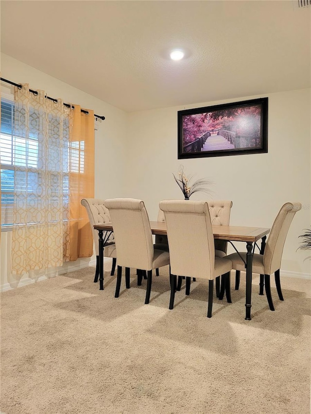 1378 Fox Squirrel Dr, Davenport, FL 33897 - carpeted dining room featuring baseboards
