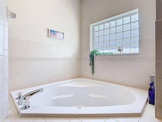123 Evergreen Dr, Auburndale, FL 33823 - full bath with tile walls and a garden tub