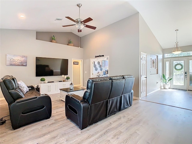 123 Evergreen Dr, Auburndale, FL 33823 - living room featuring high vaulted ceiling, a ceiling fan, baseboards, and light wood-type flooring