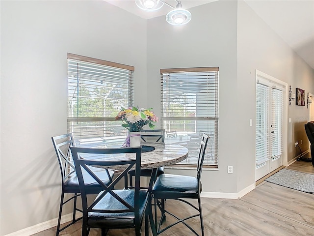 123 Evergreen Dr, Auburndale, FL 33823 - dining area with light wood-style floors and baseboards