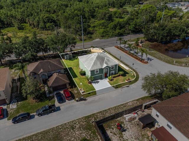 1800 Emily Dr, Winter Haven, FL 33884 - aerial overview of property's location featuring a forest and property parcel outlined