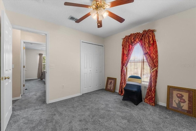 1800 Emily Dr, Winter Haven, FL 33884 - unfurnished bedroom with carpet flooring, a closet, and baseboards