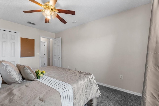 1800 Emily Dr, Winter Haven, FL 33884 - bedroom featuring carpet, a closet, baseboards, and ceiling fan
