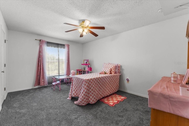 1800 Emily Dr, Winter Haven, FL 33884 - carpeted bedroom with a textured ceiling, a ceiling fan, and baseboards