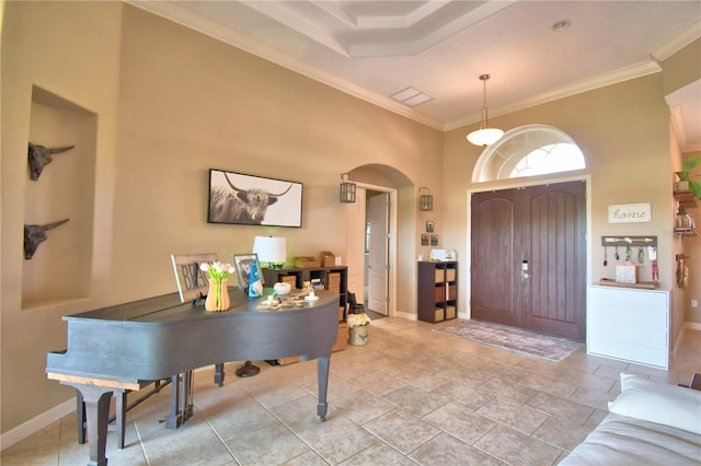 2340 Pinehurst Ct, Davenport, FL 33837 - foyer entrance with arched walkways, crown molding, and a towering ceiling