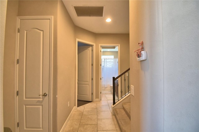 2340 Pinehurst Ct, Davenport, FL 33837 - corridor featuring tile patterned flooring, recessed lighting, and stairway