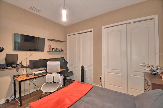 2340 Pinehurst Ct, Davenport, FL 33837 - bedroom featuring two closets and a desk