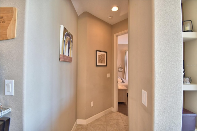 2340 Pinehurst Ct, Davenport, FL 33837 - hallway with light tile patterned floors and baseboards