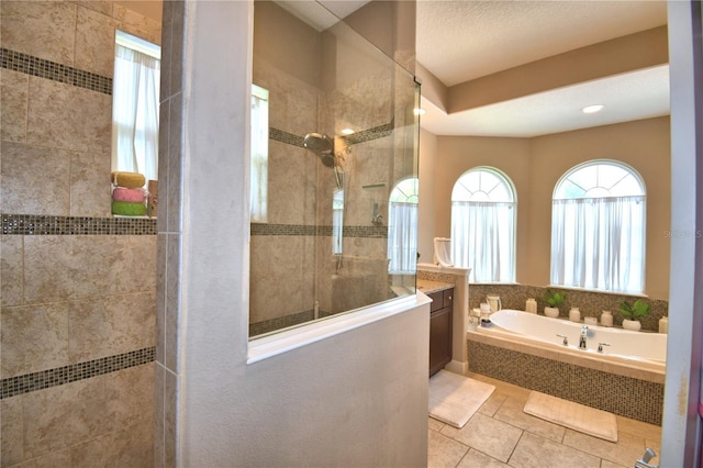 2340 Pinehurst Ct, Davenport, FL 33837 - full bathroom with plenty of natural light, walk in shower, a bath, and vanity