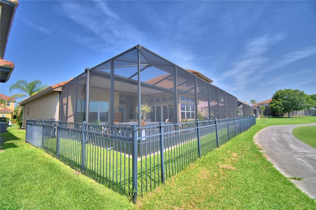 2340 Pinehurst Ct, Davenport, FL 33837 - back of house with glass enclosure
